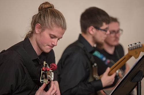 students playing guitar